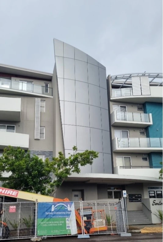 Workers recladding apartment building facade in Belmont, Brisbane